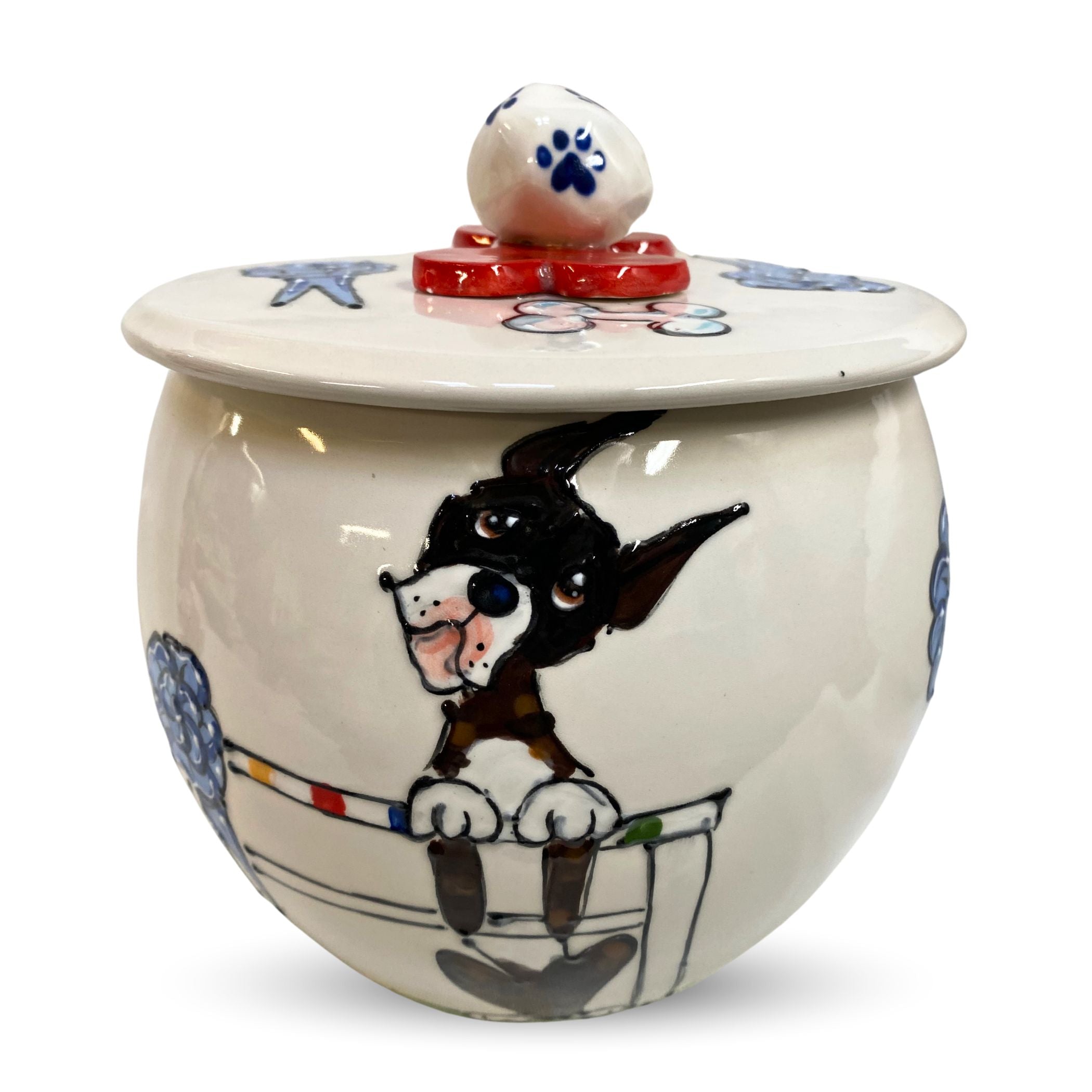 Custom hand-painted ceramic treat jar featuring a playful dog portrait with bone and paw design - food safe by Faux Paw.