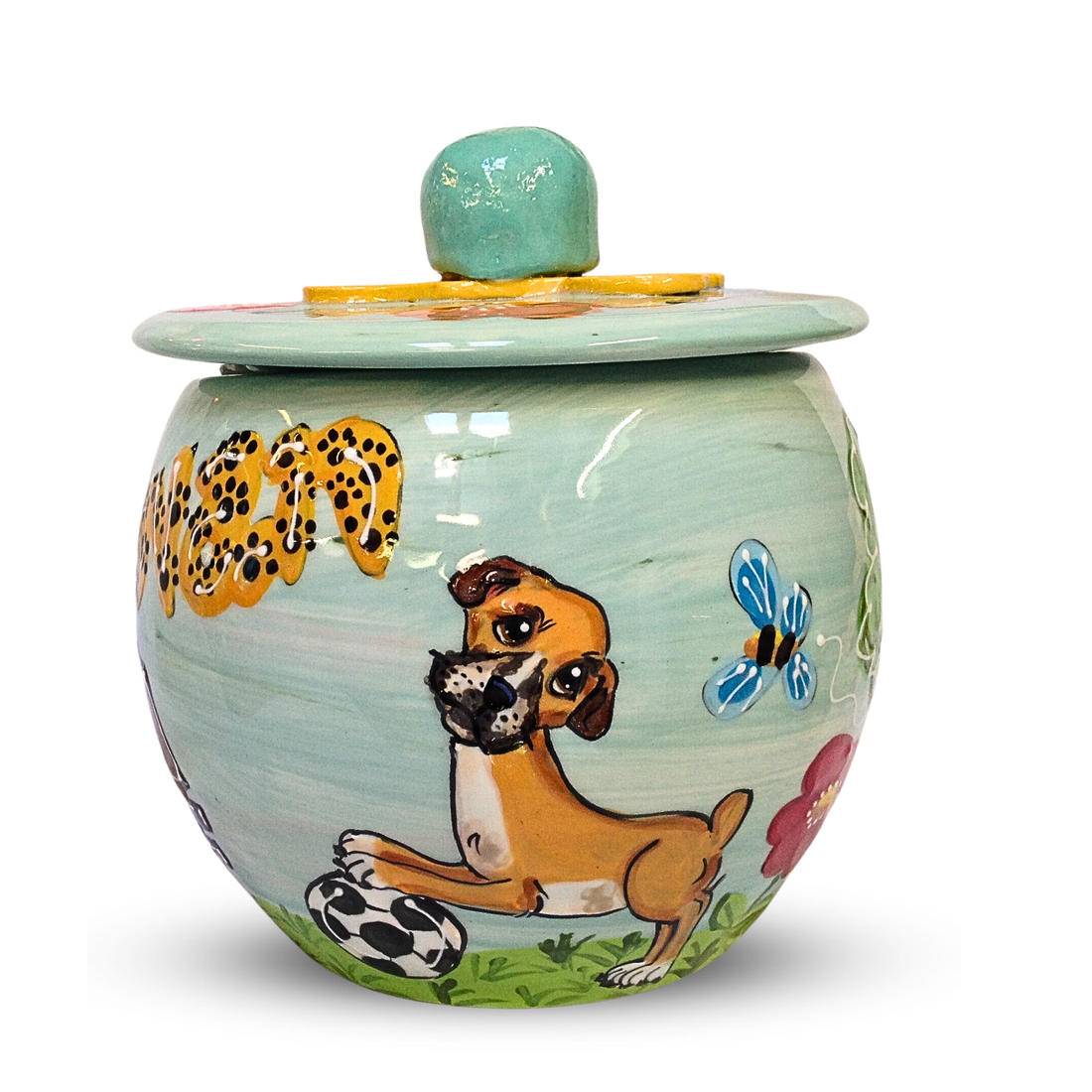 Artisanal treat jar painted with a frolicsome dog, leopard spots, and whimsical insects, topped with a pastel blue lid adorned with a sunny yellow accent