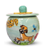 Artisanal treat jar painted with a frolicsome dog, leopard spots, and whimsical insects, topped with a pastel blue lid adorned with a sunny yellow accent