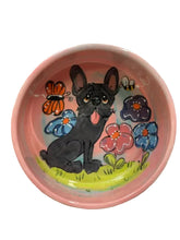 French Bulldog Bowl in the garden with a birdie