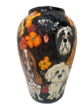 Many dogs vase