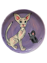 Hairless cat dish with birdie