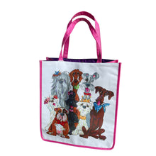 Frontal display of the 'Best In Show' vinyl tote highlighting a medley of whimsical dog illustrations by Debby Carman.
