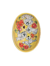 Coton de Tulear, Maltipoo and Poodle in the house serving bowl platter