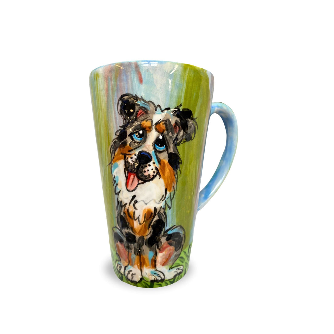 A hand-painted mug with an Australian Shepherd&