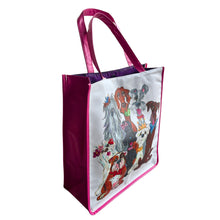 Side profile of the 'Best In Show' vinyl tote showcasing Debby Carman's dog artwork.