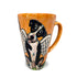 A 16 oz tall latte mug with a whimsical hand-painted angelic Border Collie with wings, in warm orange tones, designed by Debby Carman.