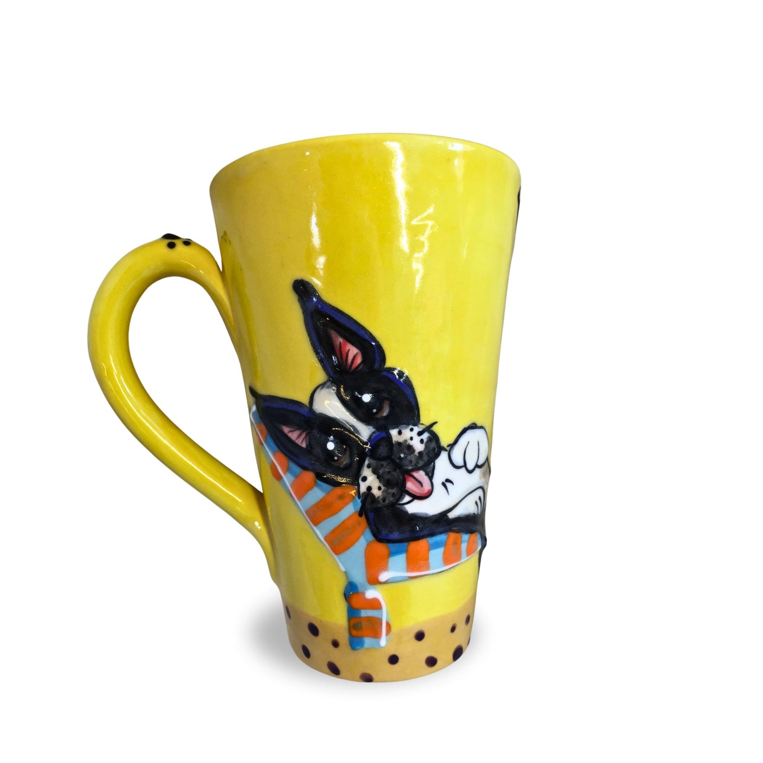 A vibrant yellow, hand-painted ceramic mug with an illustration of a Boston Terrier wearing sunglasses and lounging in a beach chair, created by Debby Carman