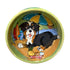 Colorful hand-painted ceramic bowl featuring a playful Bernedoodle dog at a beach picnic scene with surfboards and ocean waves, part of the unique "Canine Coastline" Series for pets