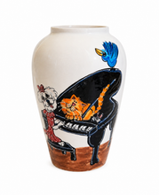The conductor is in the house 14” vase