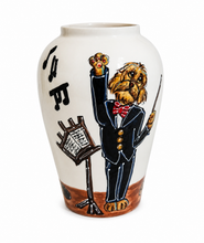 The conductor is in the house 14” vase