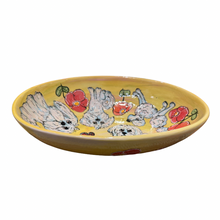 Coton de Tulear, Maltipoo and Poodle in the house serving bowl platter