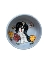Cavalier King Charles Spaniel in the flowers n butterflies