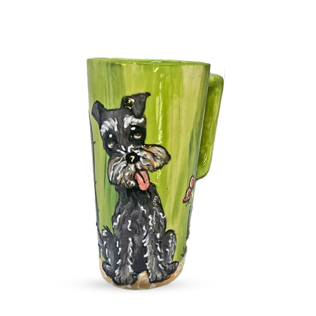 Hand-painted green coffee mug featuring a detailed Schnauzer portrait, full of character, with a lush background that complements the dog&