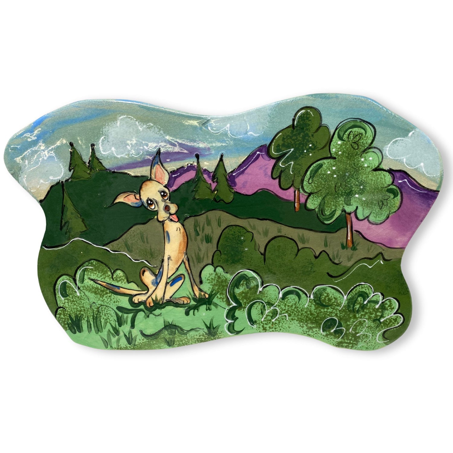 Hand-painted ceramic tile showing a whimsical portrait of a Chihuahua in an enchanted forest setting with vibrant trees and mountain background, custom-made by artist Debby Carman