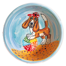 MAGE OF BASSET HOUND PLAYING WITH BEACH BALL IN THE SAND HAND PAINTED BY FAUX PAW PRODUCTIONS ARTIST Debby Carman ON CERAMIC FOOD OR WATER BOWL