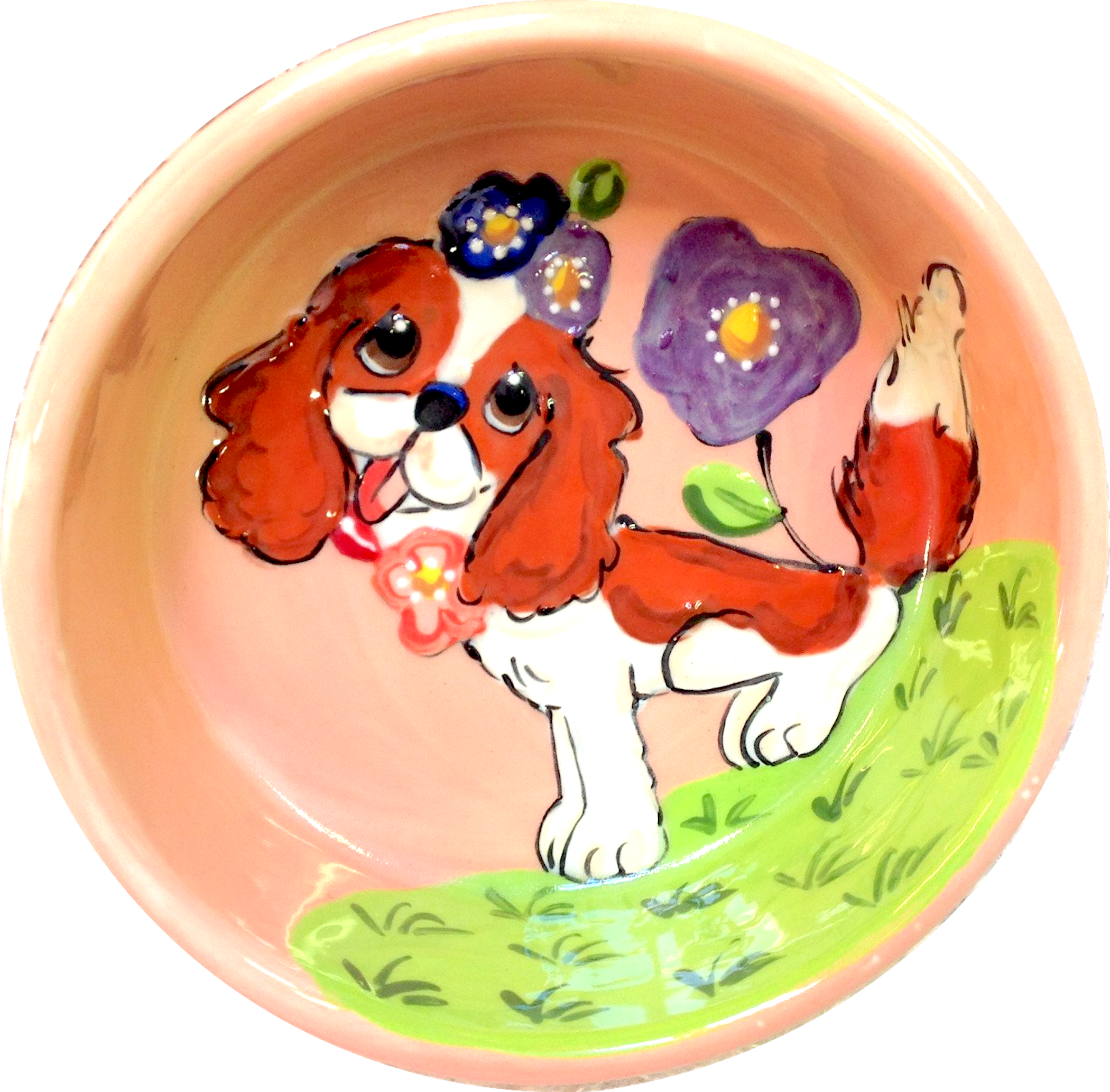 Sweet King Charles sitting in flowers dog bowl