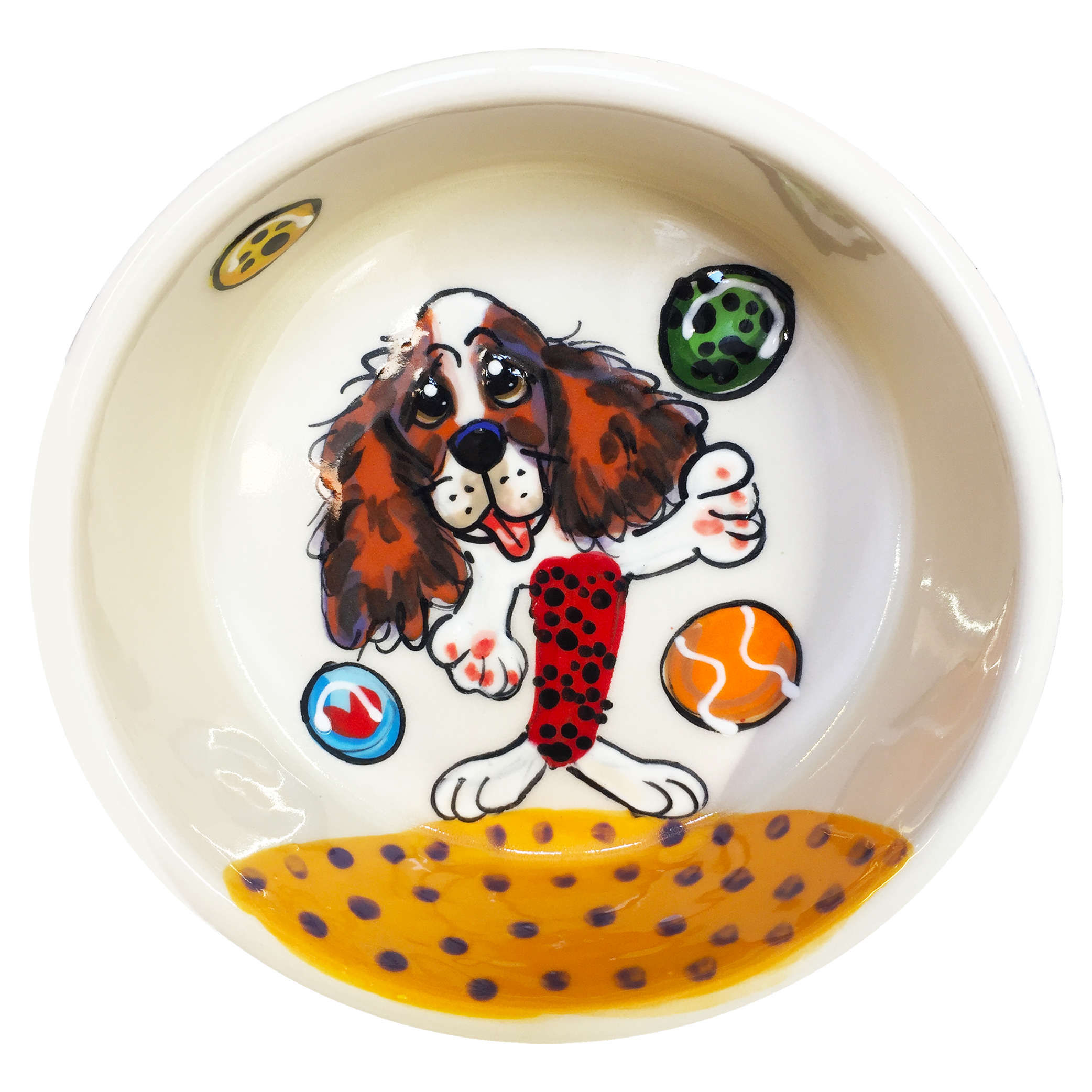 Image of cavalier king charles spaniel playfully ready for fetching tennis balls at the beach hand painted on ceramic pet bowl by faux paw productions artist Debby Carman 