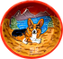 photo of glazed red ceramic bowl with corgi on personalized pet bowl with Lake Tahoe in the background, by Debby Carman, faux paw petique