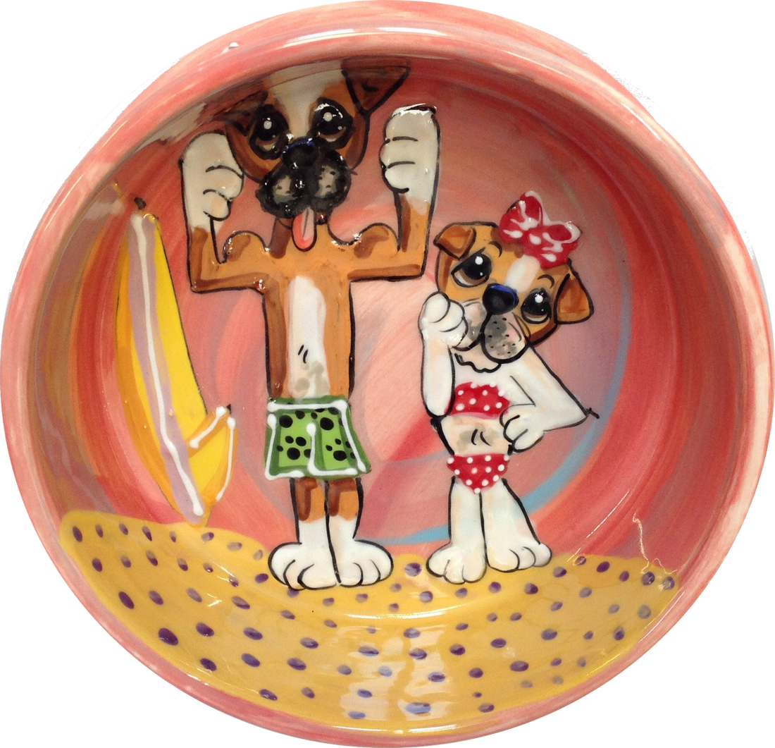 Photo of bulldogs on beach handpainted on ceramic dog food or water bowl by Debby Carman 