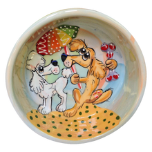 Golden Retriever and Poodle Dog Bowl and Doodle Hanging at the beach