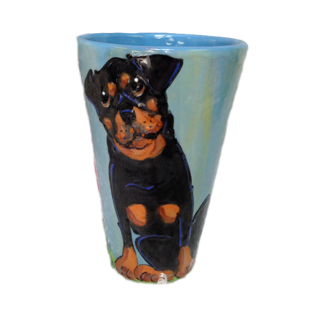 Photo of rottweiler hand painted on ceramic latte mug with blue background by Debby Carman 