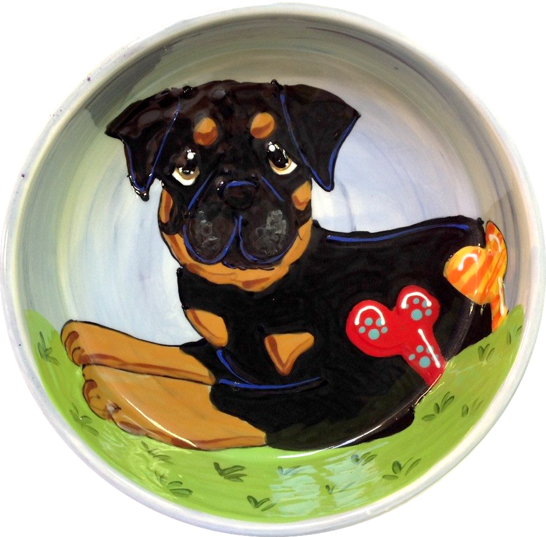 Ceramic dog bowl with bones and personalized with pet name featuring custom Rottweiler portrait by Debby Carman 