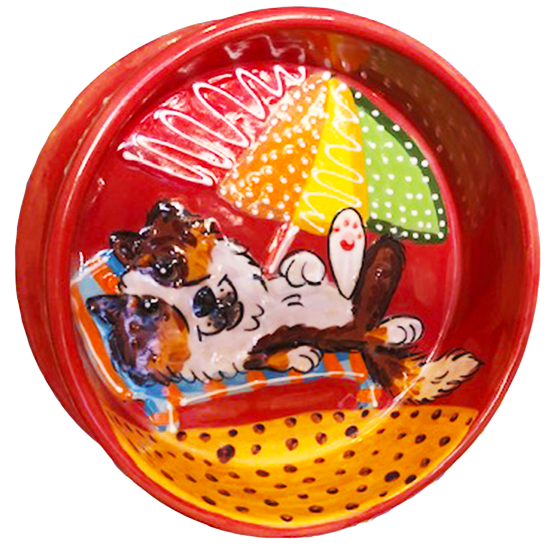 photo of red dog bowl with hand painted sheltie dog lounging on the beach