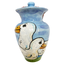 HANDMADE CERAMIC PET URN FROM WWW.FAUXPAWPRODUCTIONS.COM