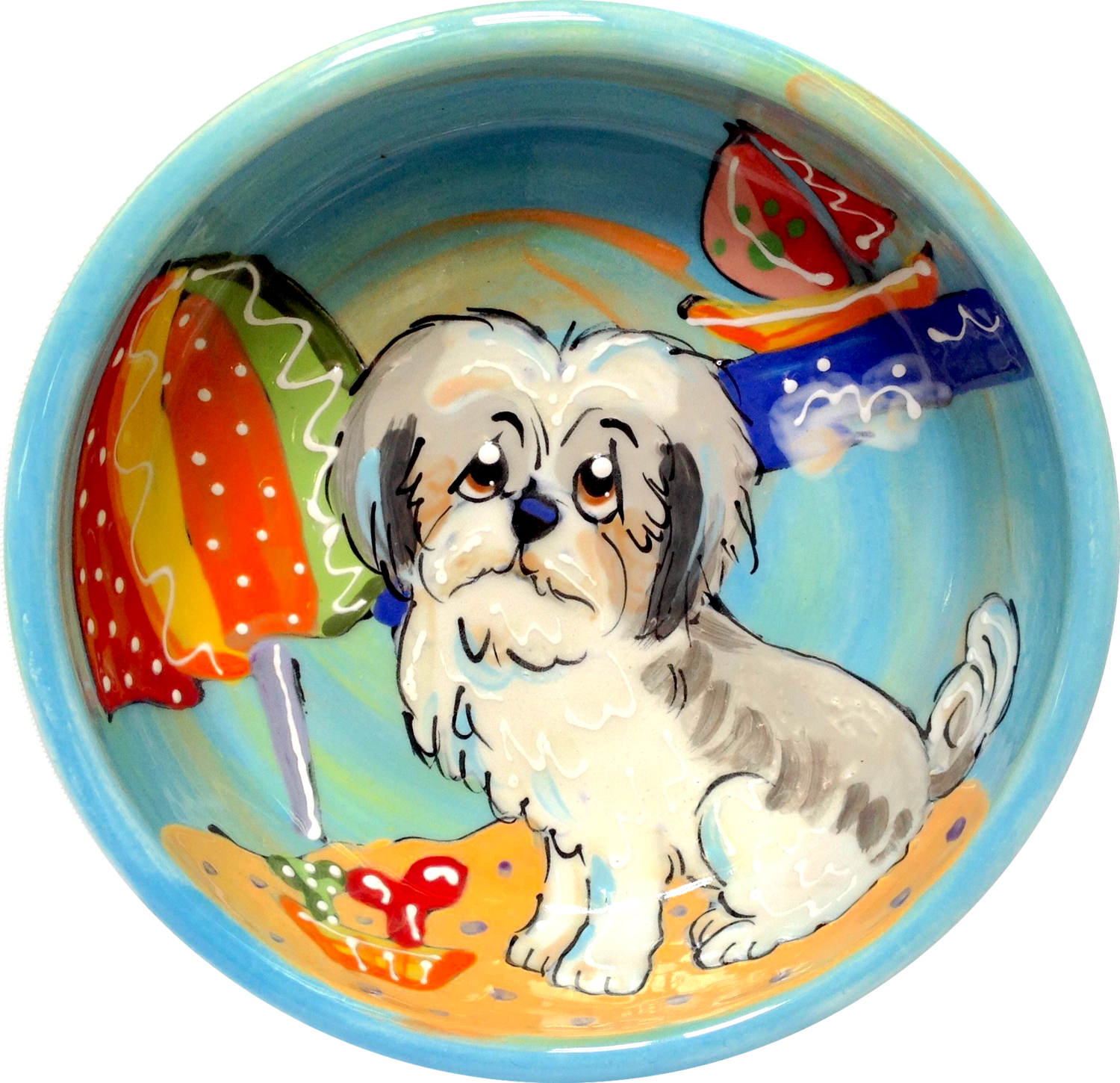 photo of blue ceramic dog bowl with hand painted Shih Tzu portrayal on a beach with bones buried in the sand and sailboat in the background as a unique dog gift