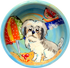 photo of blue ceramic dog bowl with hand painted Shih Tzu portrayal on a beach with bones buried in the sand and sailboat in the background as a unique dog gift