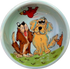 image of ceramic dog bowl hand painted by Debby Carman featuring Labrador retriever and cavalier King Charles looking amazed by bird flying overhead